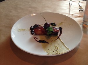 Bourbon-glazed pork belly with pistachio butter and cherry-vanilla jam