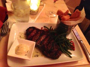 Here's my $33 grilled strip steak. The only thing good on this plate were the fries.